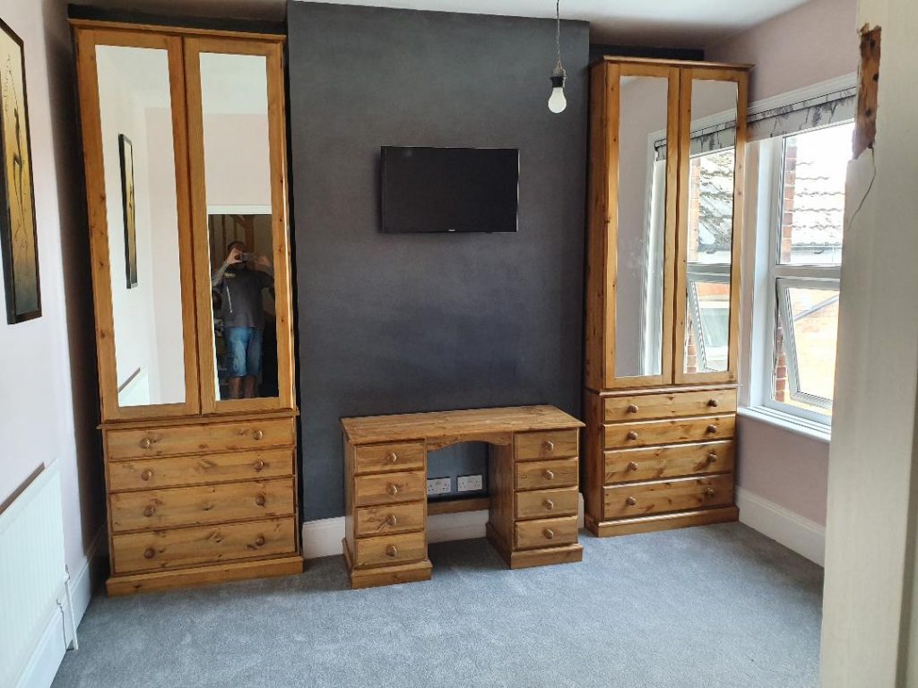 All hanging mirrored wardrobes on top of 4 drawer chests